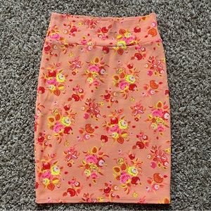 Neon roses, pencil skirt, stretchy, and flattering